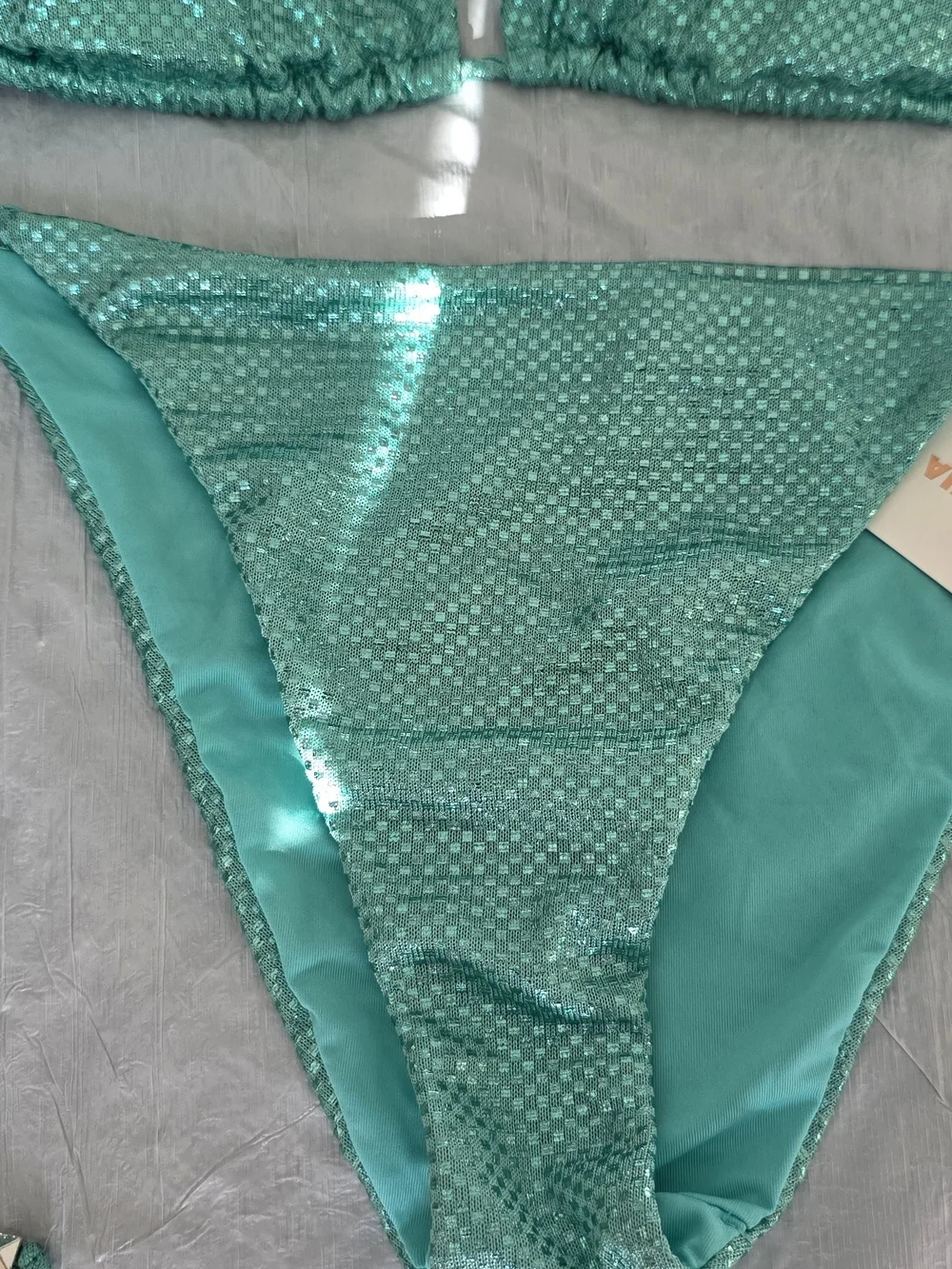 Calzedonia teal triangle